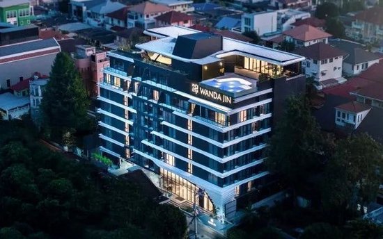 万达酒店发展抛售核心资产，24亿港元或派息“入袋”王健林父子
